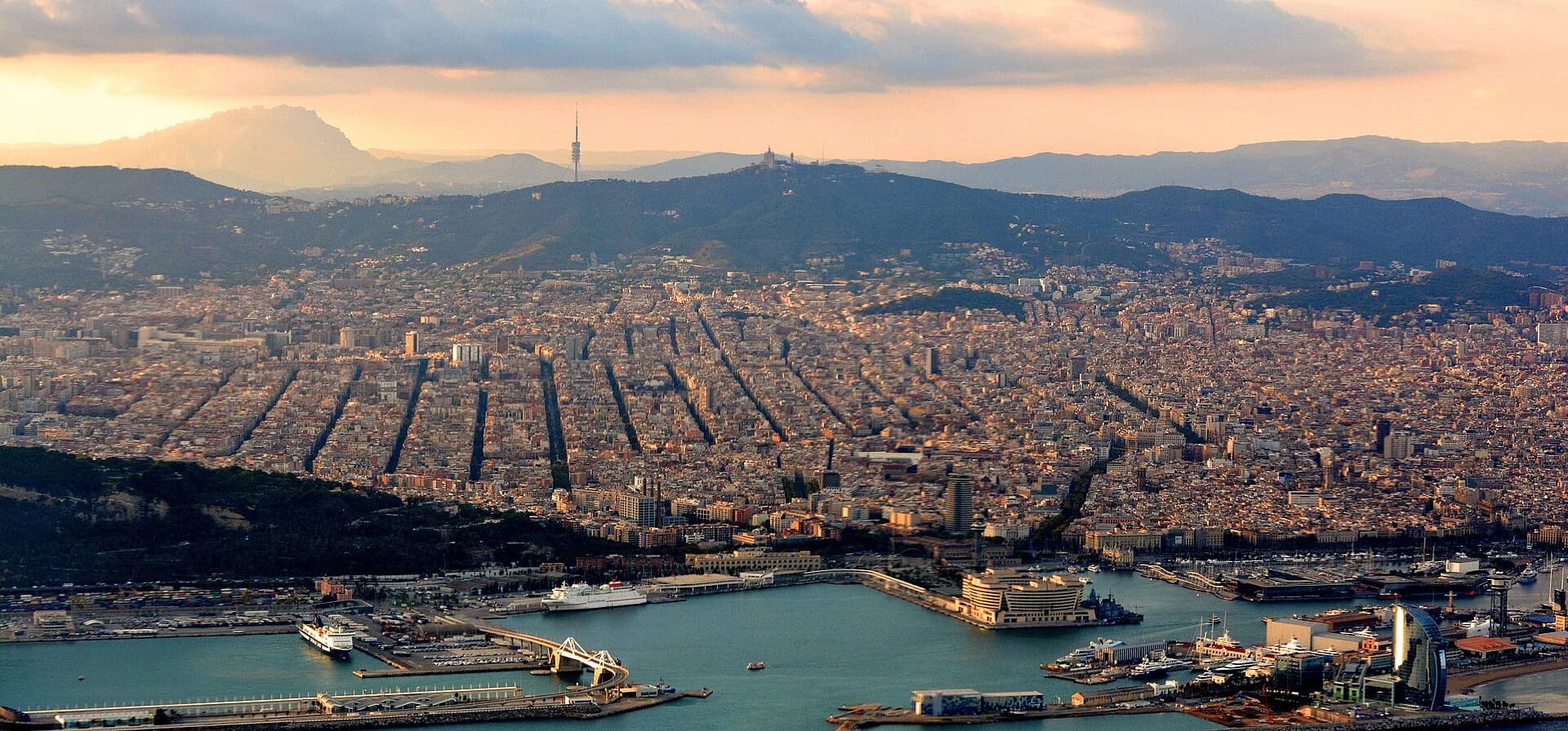 Barcelona and its harbour in evening light