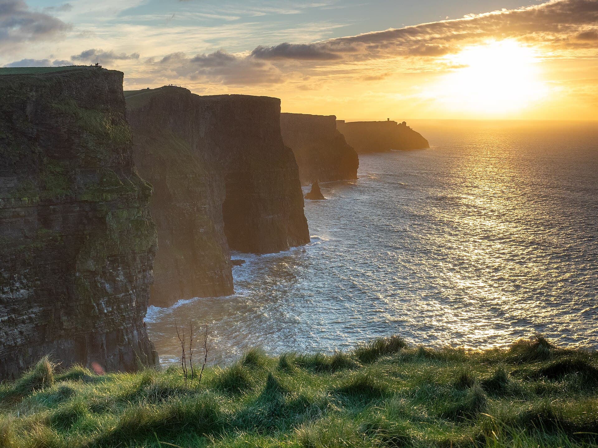Sunset over the Cliffs of Moher and the Atlantic Ocean
